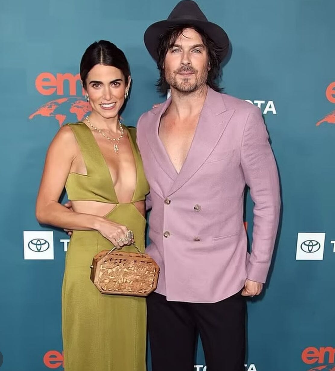 Nikki Reed carries Blumera Wood Carved Poppies Clutch to the EMA Awards