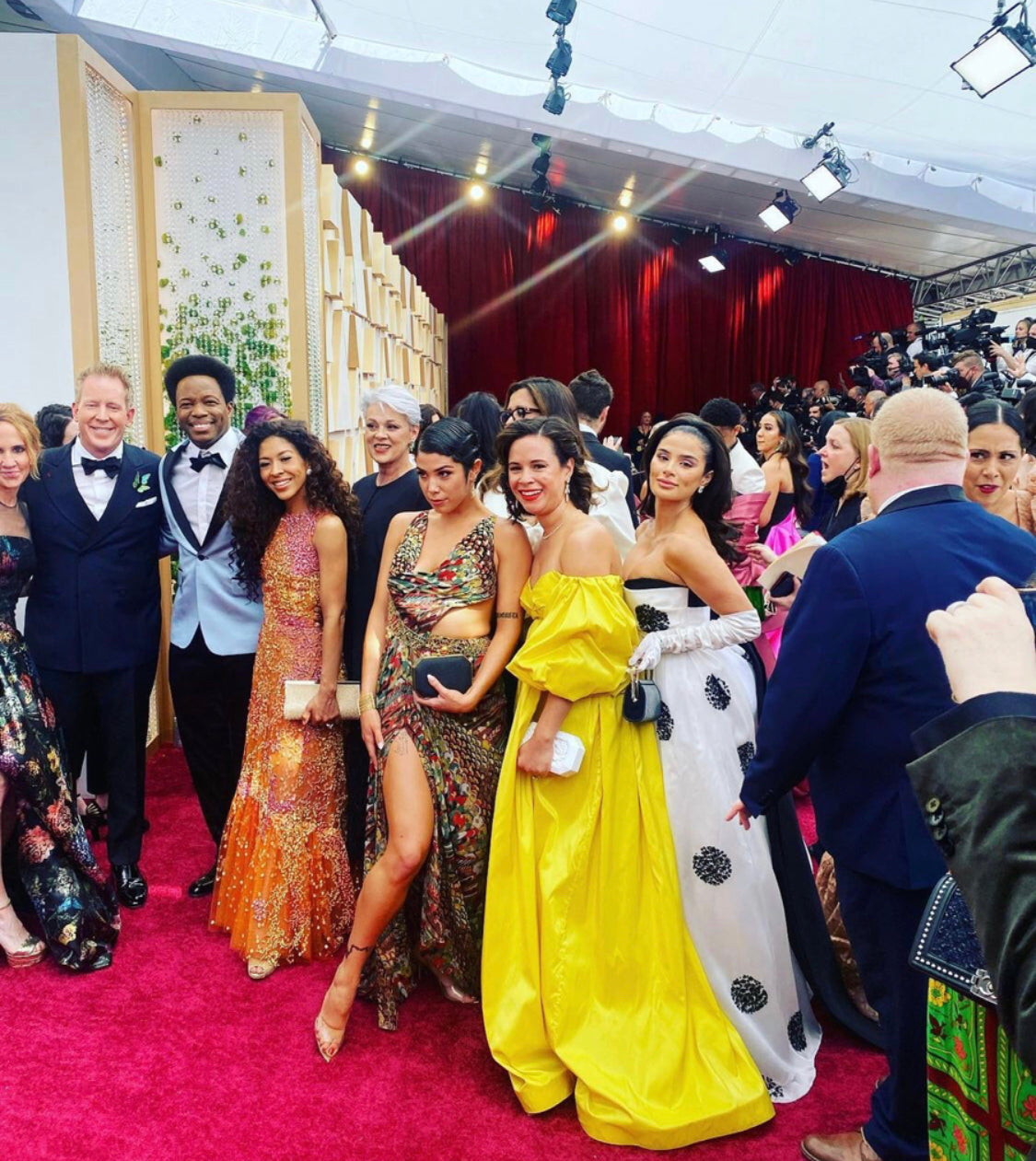 Oscars 2022: Encanto Cast with Director, Writer, Producer “Encanto” Writer/Director Charise Castro Smith clutching Blumera
