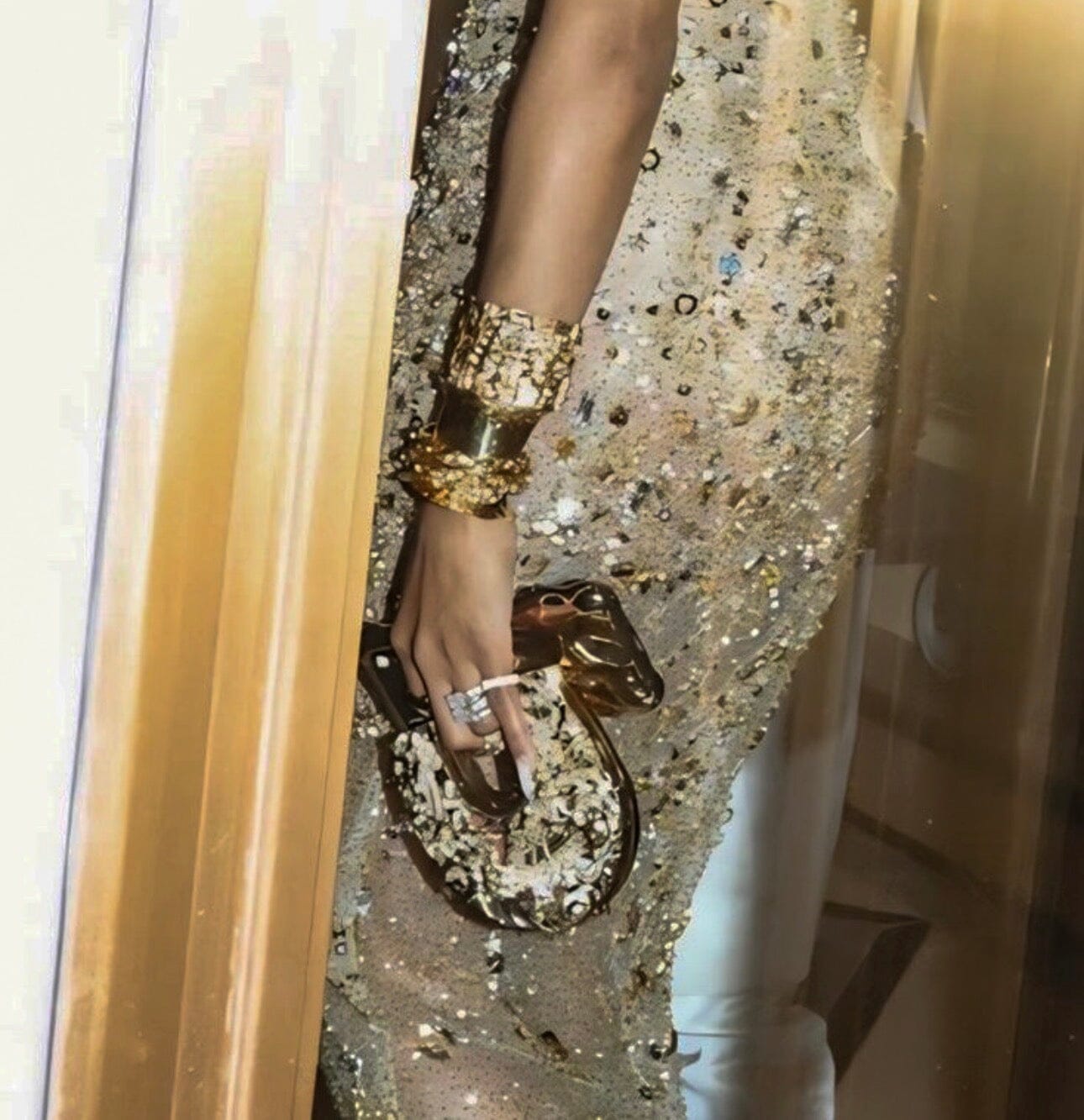 Ciara carrying the Blumera Simurgh & Hummingbirds Brass Mini U Horseshoe Clutch at the Met Gala 2026