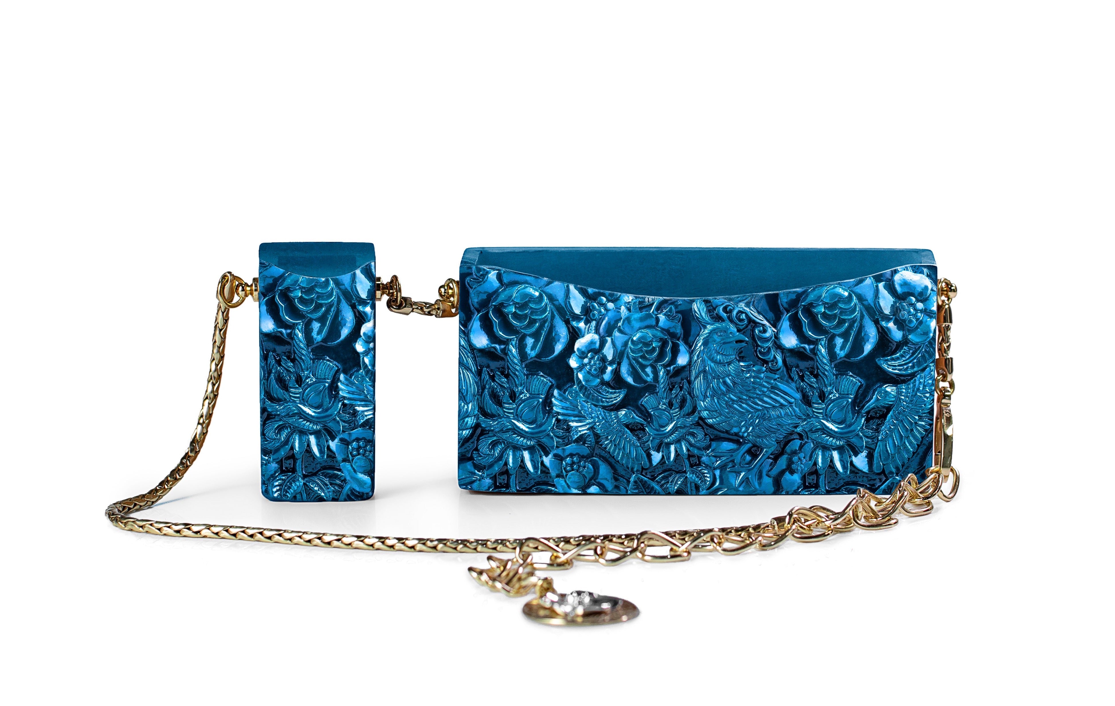 The most stunning belt bag you have ever seen. Meticulously hand-crafted to fit the essentials: lipstick and phone, the Hummingbird and Quail Belt Bag, is sure to be the perfect hands-free bag of your dreams.