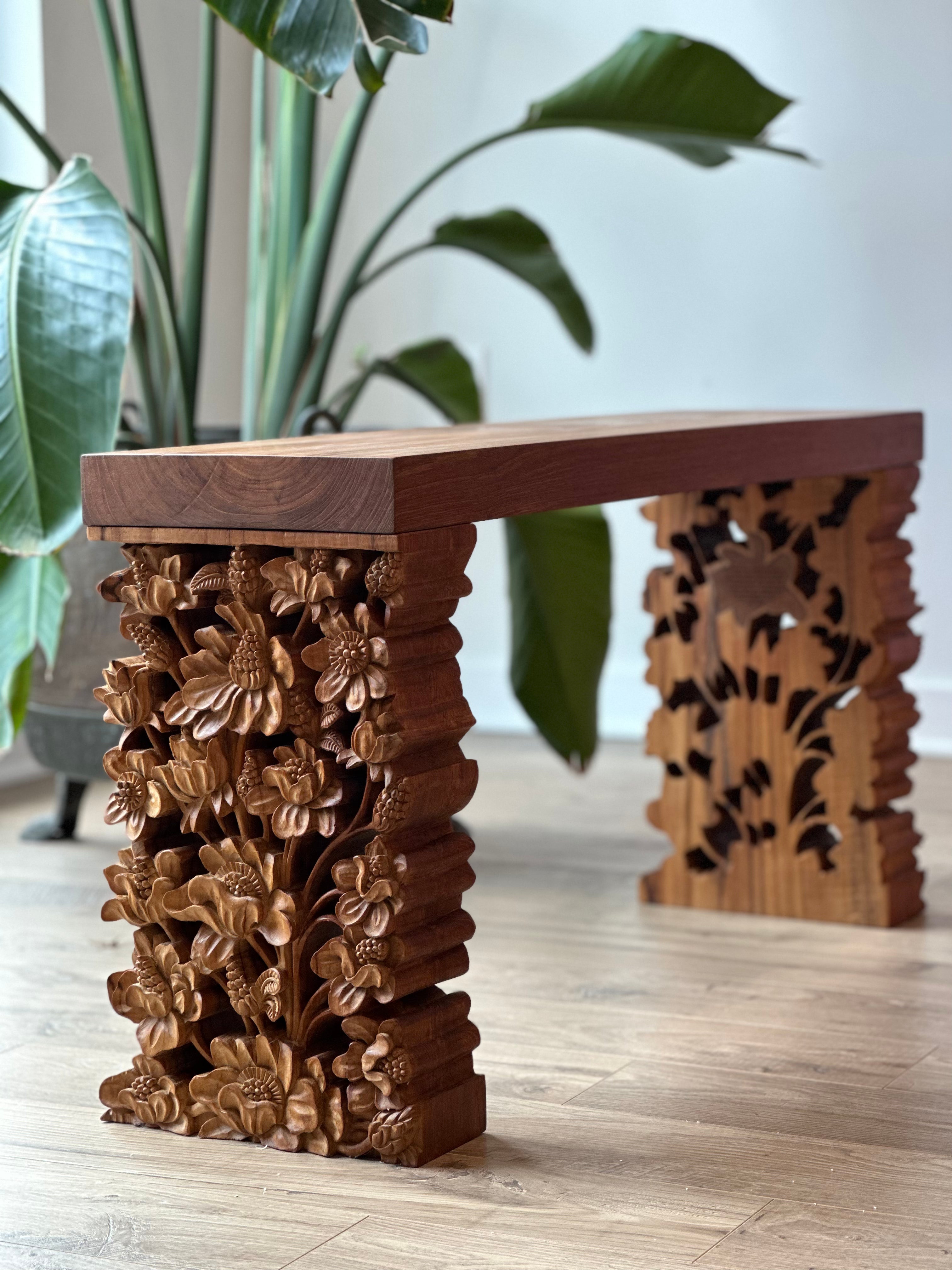 Blumera sculptural table, carved by hand from solid teak and designed as a collectible heirloom. Luxury, Bespoke Furniture.